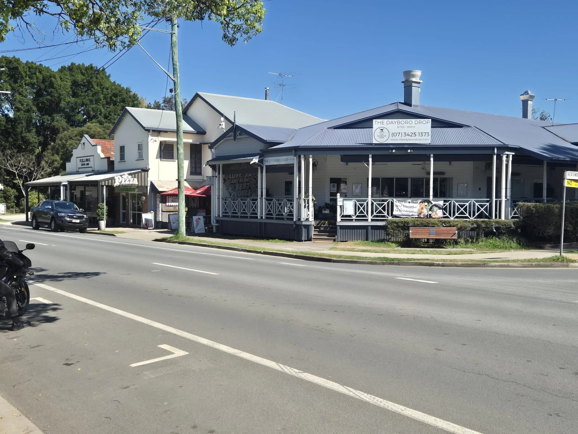 The Dayboro Drop restaurant with its sign above the shaded veranda.